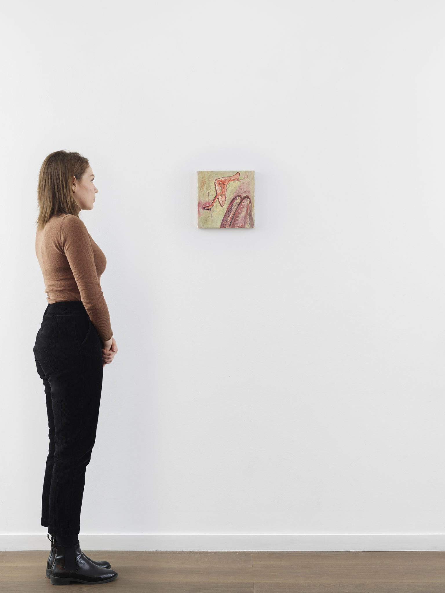 Model standing in front of Jutta Koether's Jane Bowles painting