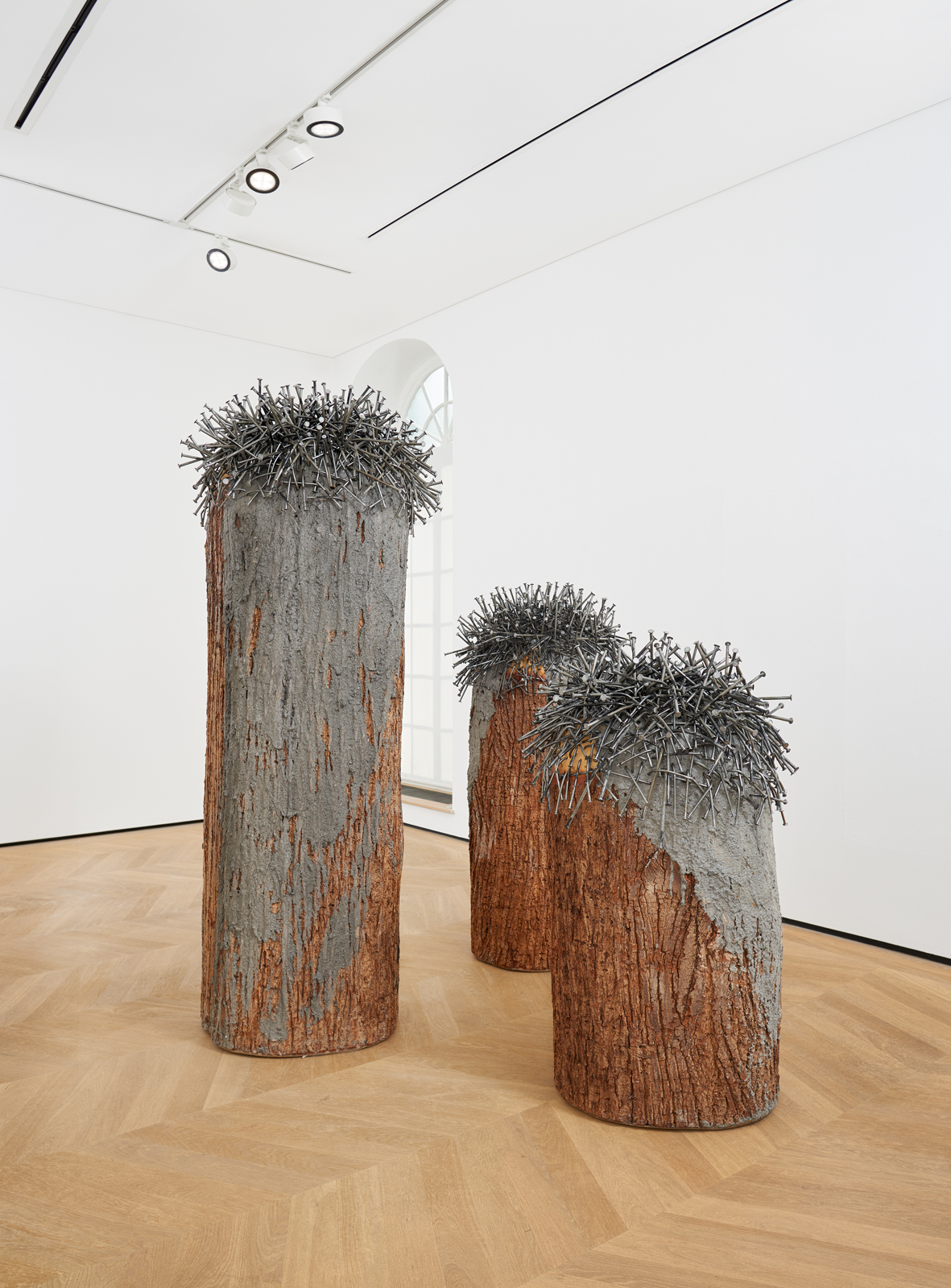Install view of Günther Uecker's sculpture Bäume aus einem Stamm, 2009–15