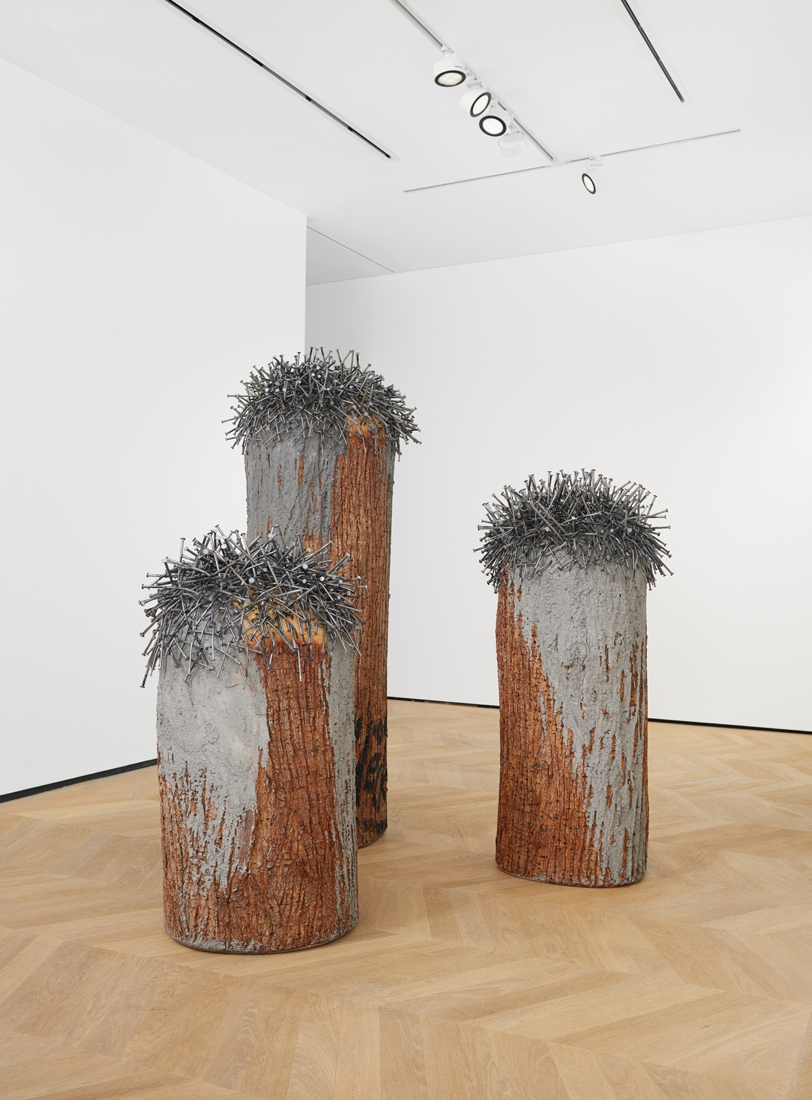 Install view of Günther Uecker's sculpture Bäume aus einem Stamm, 2009–15