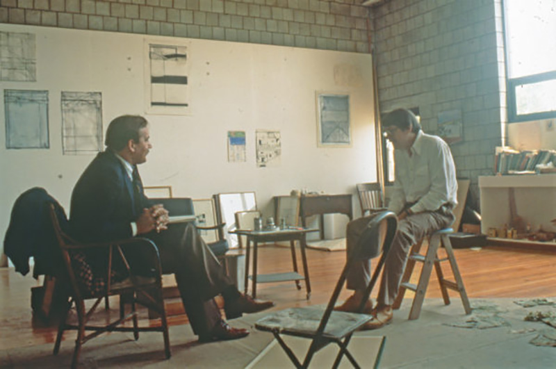 Image of Richard Diebenkorn and George Neubertin sitting in Diebenkorn's studio