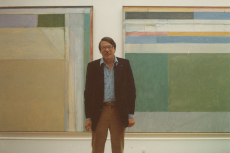 Richard Diebenkorn at the Venice Biennale in front of two of his Ocean Park paintings