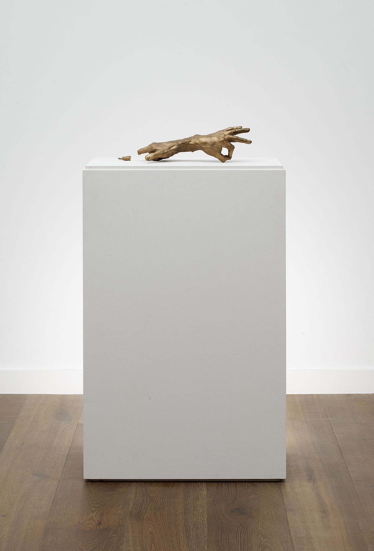 Installation view of Bruce Nauman's silicon bronze sculpture Hand Pair